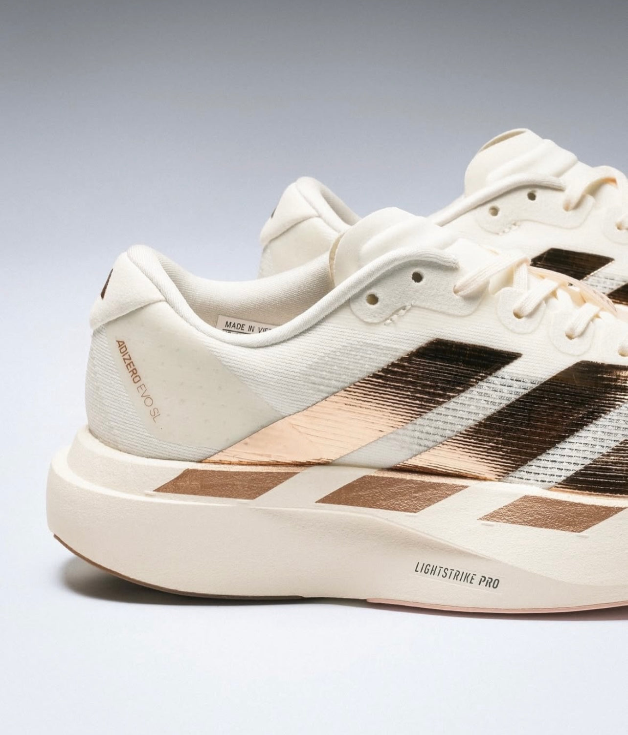 Adidas Adizero EVO SL - Metallic Stripes Off White (Pronta Entrega)