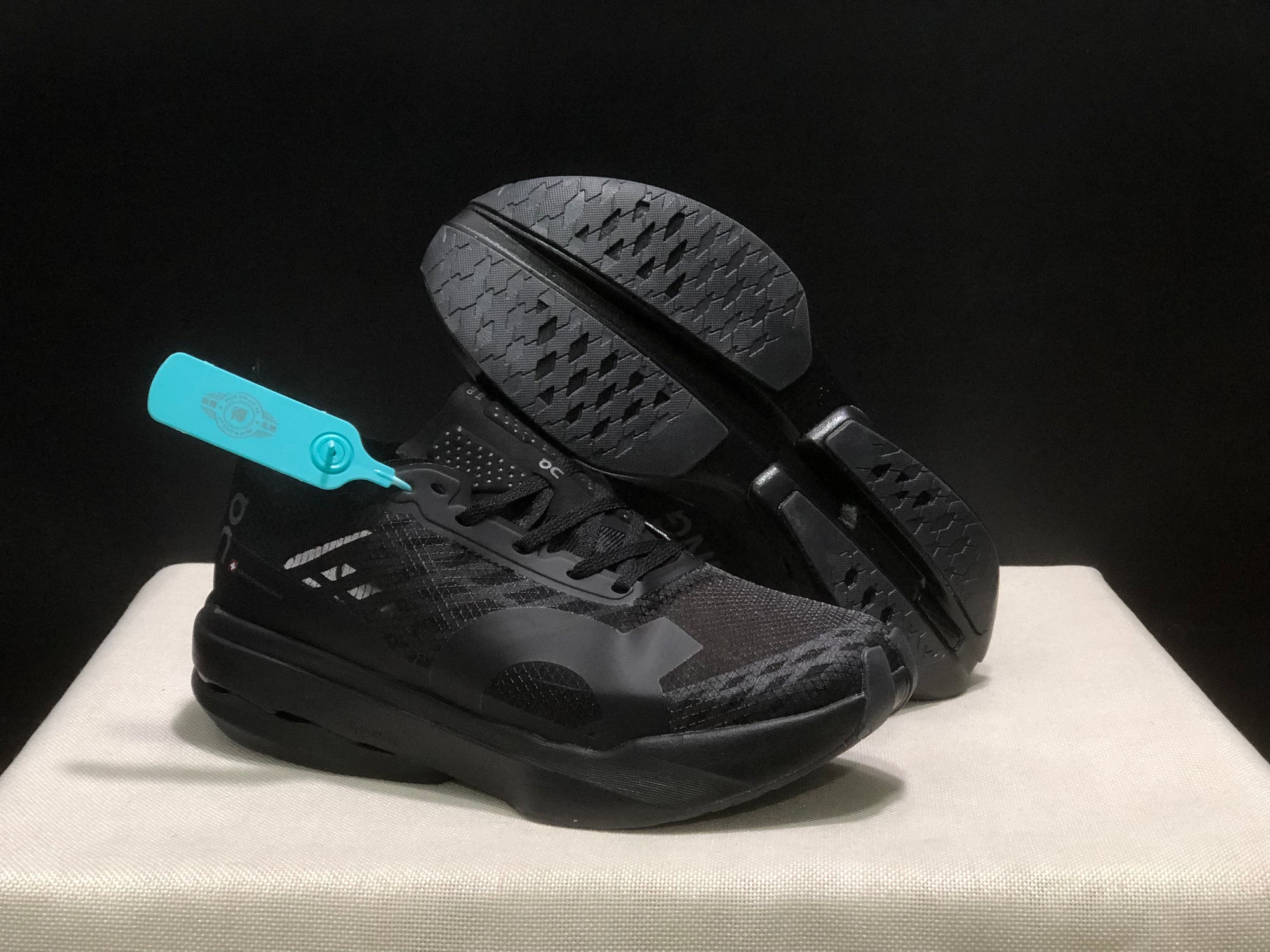 On Cloudboom Triple Black